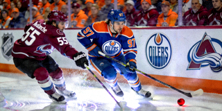 Edmonton Oilers vs Colorado Avalanche game action shot
